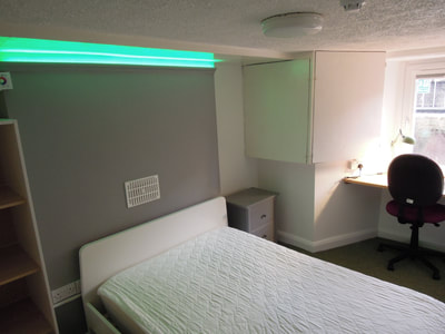 bedroom with LED lighting